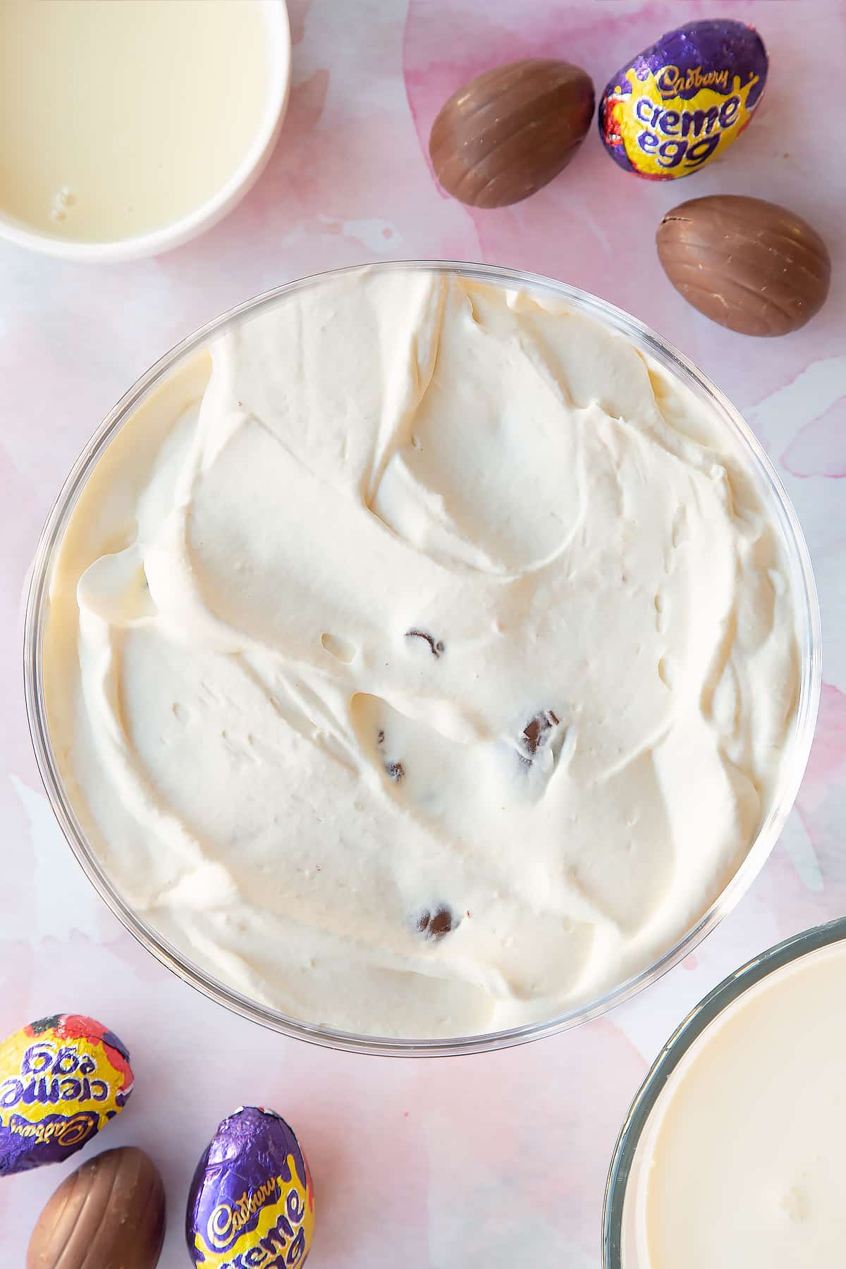 Creme Egg ice cream mixture in a mixing bowl.