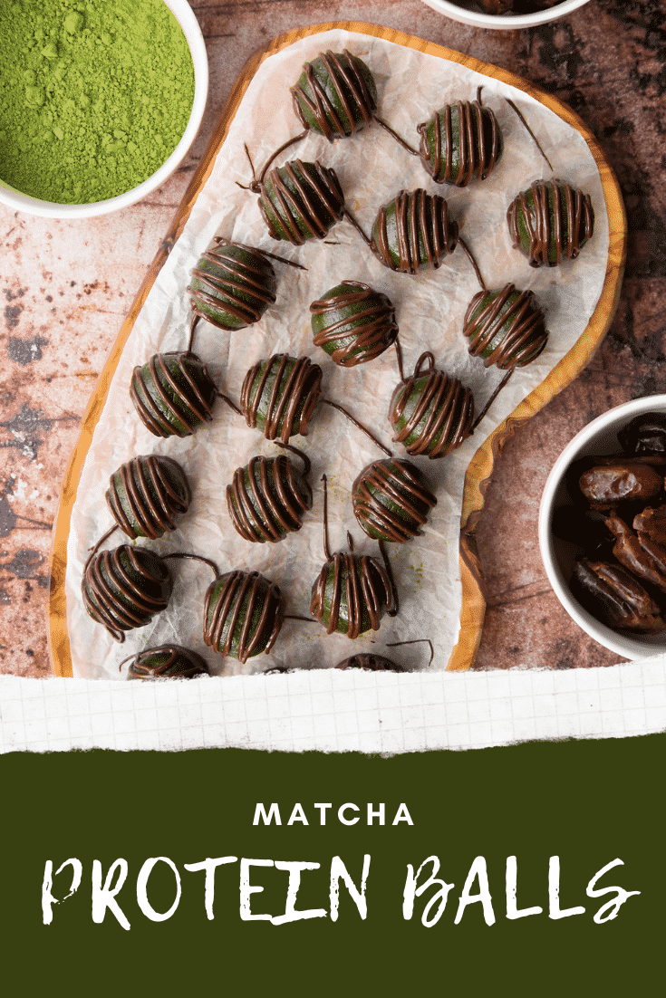 Matcha protein balls from above on a wooden board lined with baking paper. Caption reads: matcha protein balls