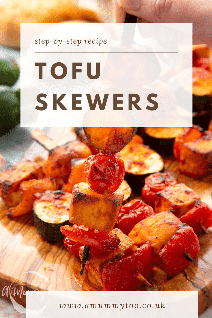 Tofu skewers arranged on a board. A hand holds one. Caption reads: Step-by-step recipe. Tofu skewers.