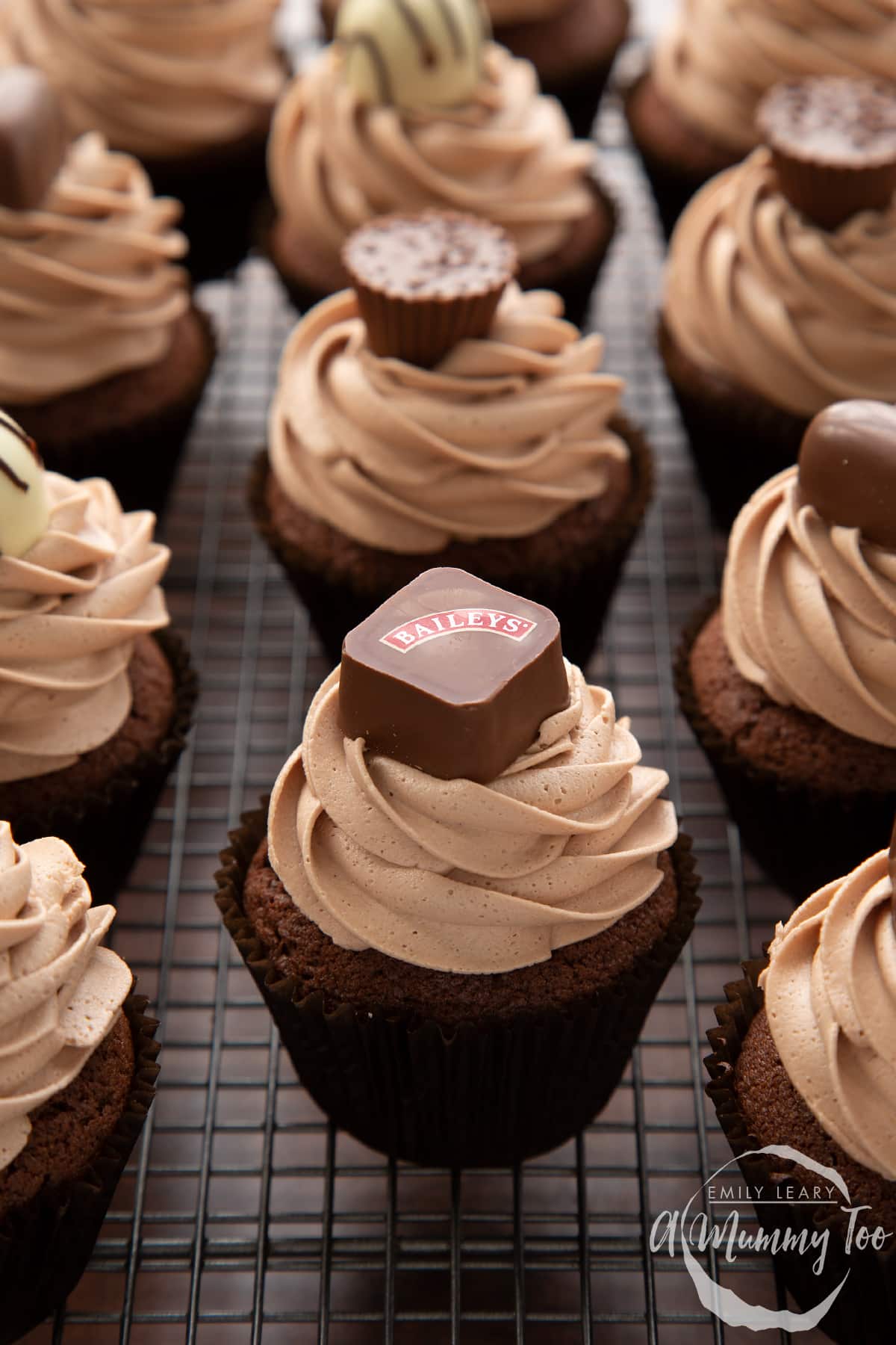 Baileys chocolate cupcakes topped with Baileys icing and a Baileys chocolate.