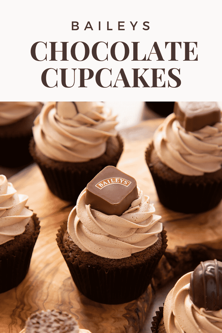 Baileys chocolate cupcake on a board. Caption reads: Baileys chocolate cupcakes.
