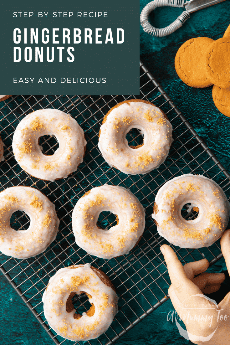 Baked gingerbread donuts with a lemon glaze on a wire cooling rack. A hand reaches for one. Caption reads: Step-by-step recipe. Gingerbread donuts. Easy and delicious.