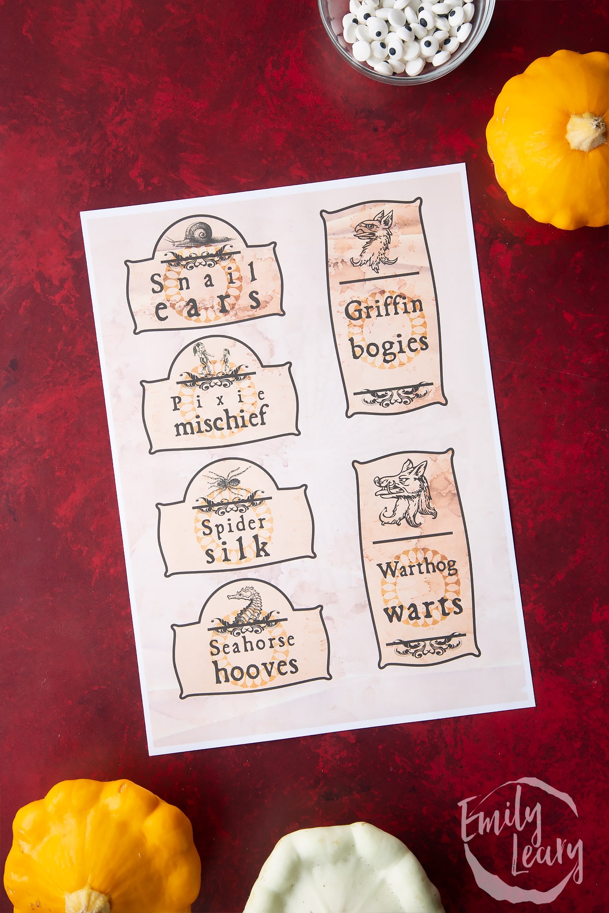 A printable sheet of Halloween apothecary labels on a red background.
