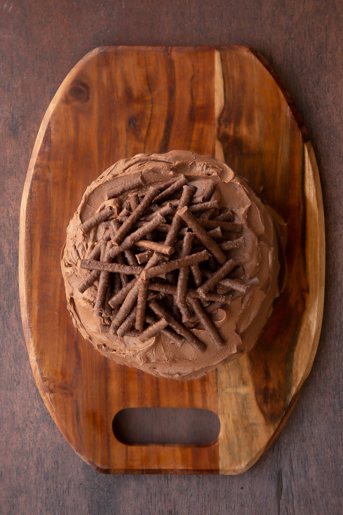 Mint chocolate Matchmaker cake on a wooden board, shown from above.