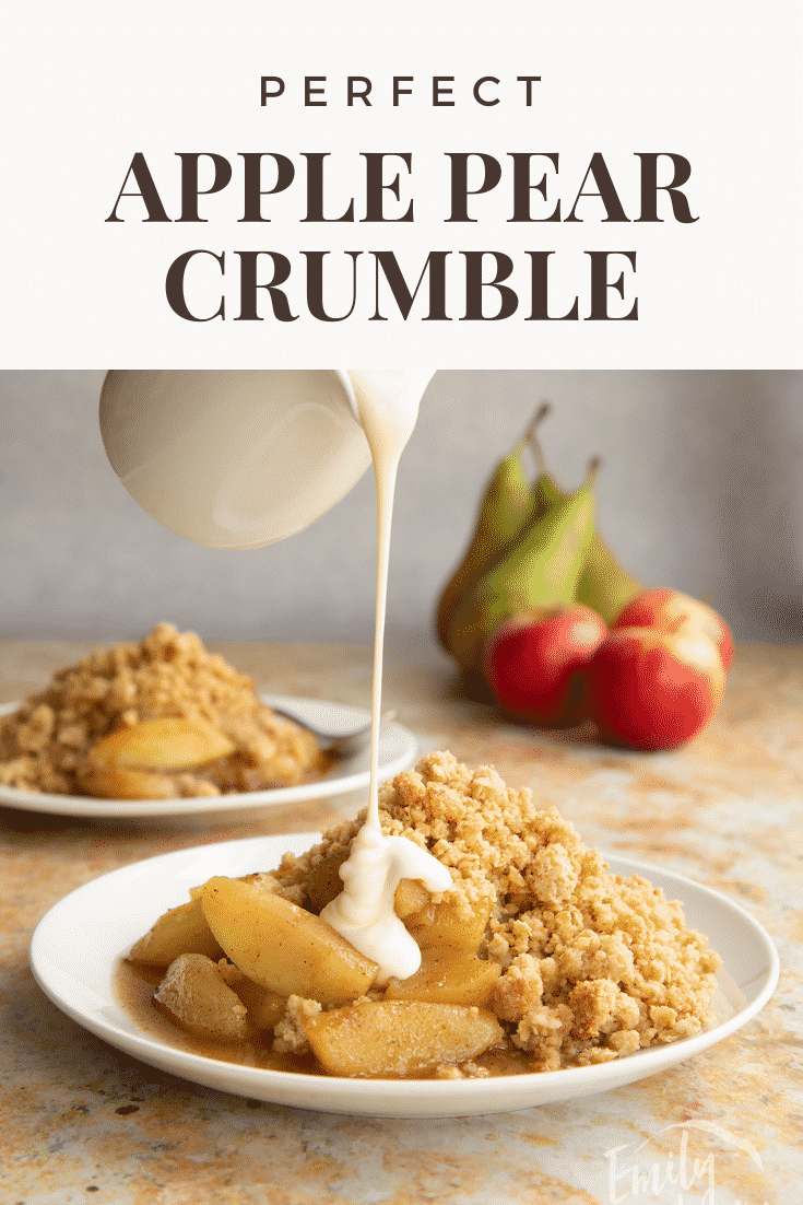Apple pear crumble and custard served to a small white plate. Caption reads: Perfect apple pear crumble.
