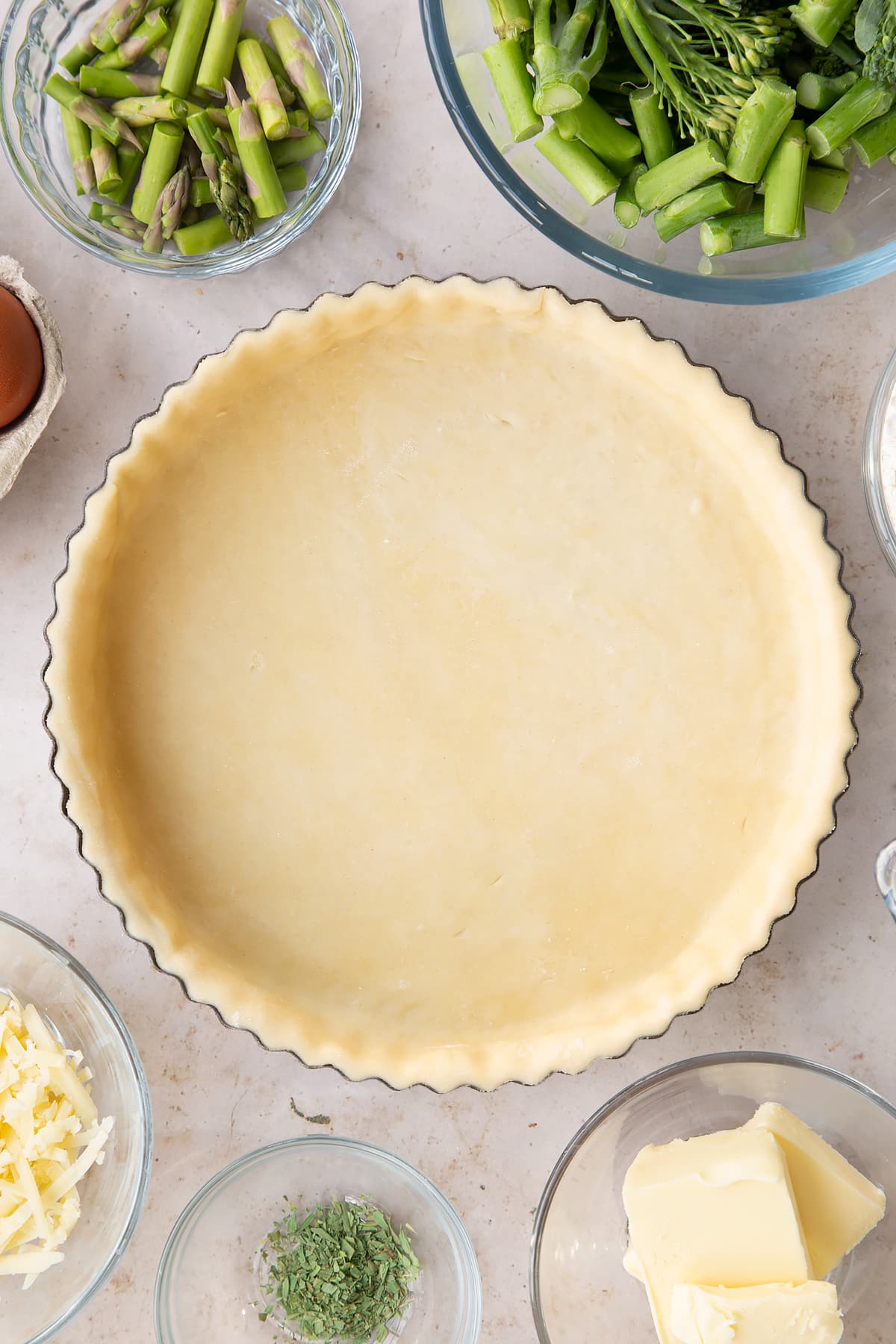 Overhead shot of the finished raw chestnut quiche pastry casing.