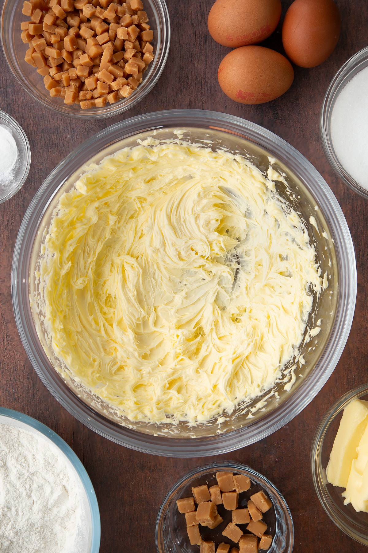 softened and beaten butter in a large clear bowl.