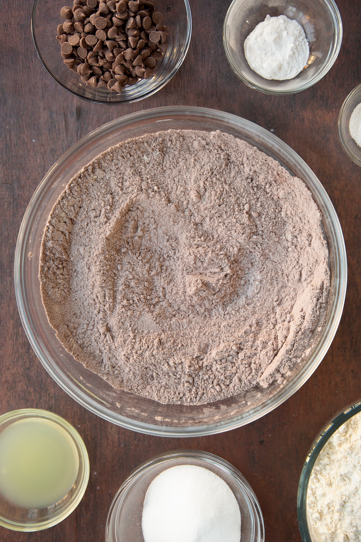 Overhead shot of the chocolate soda bread ingredients being mixed together in a bowl.