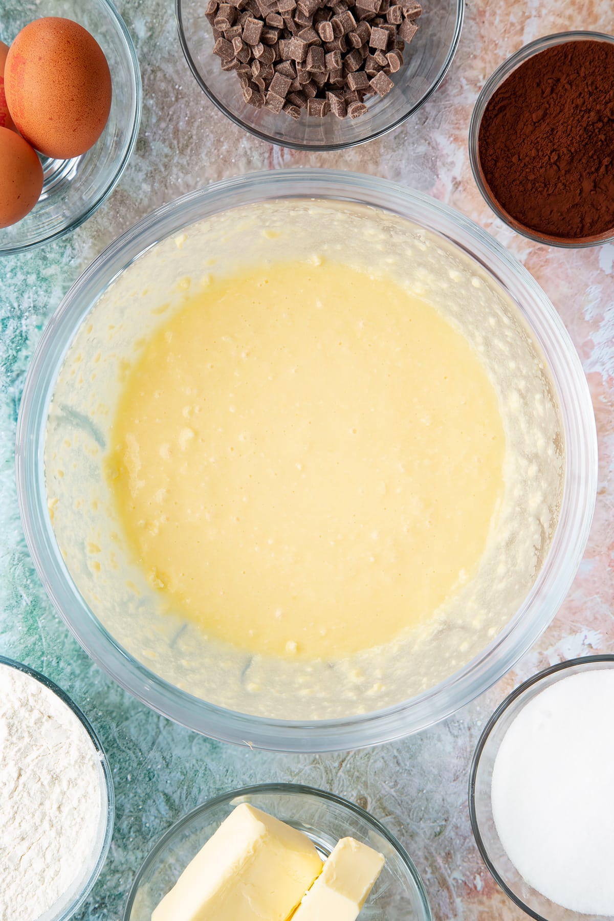 Overhead shot of some of the ingredients in a mixing bowl having been mixed together.
