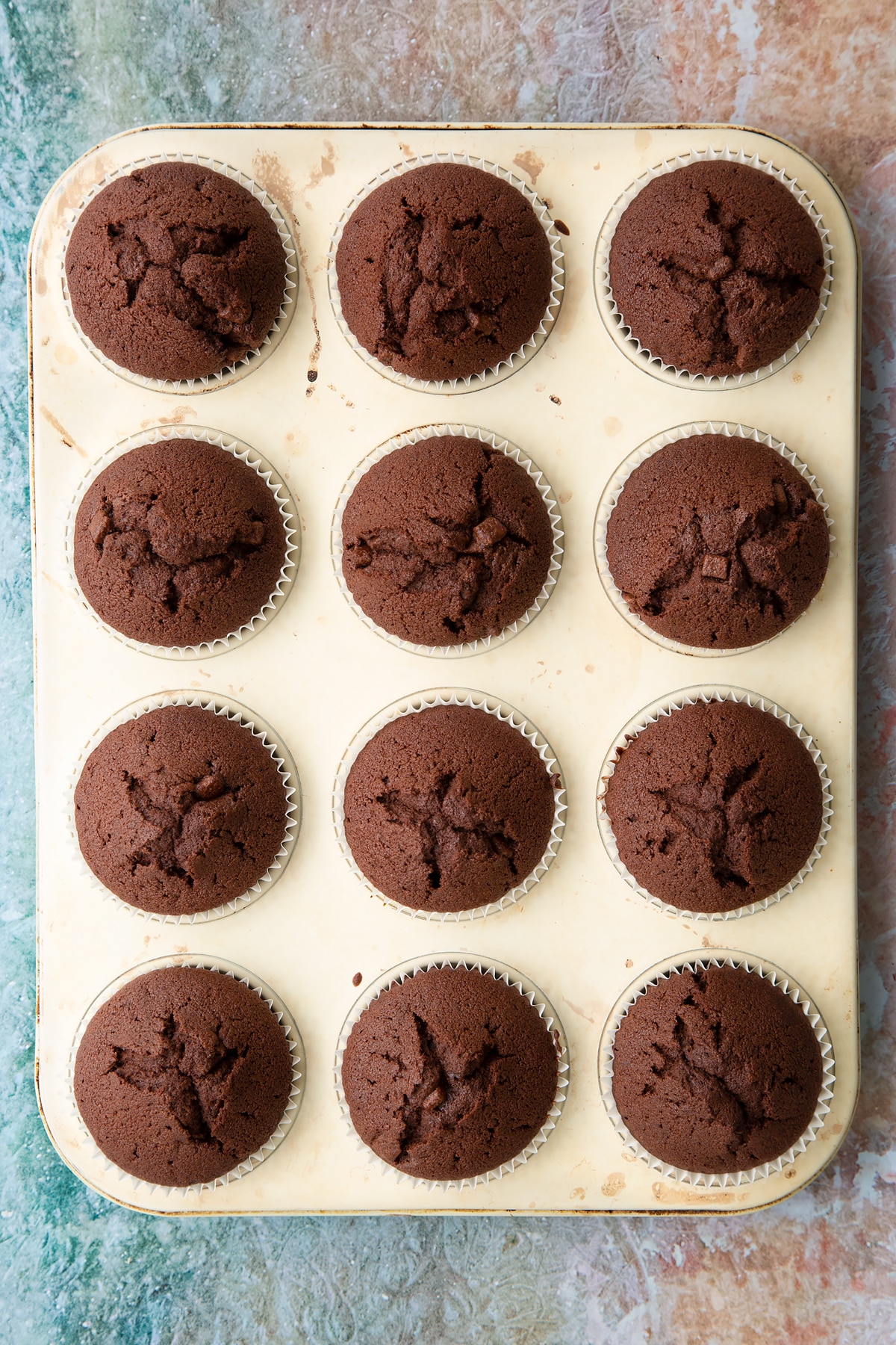 Overhead shot of the mint choc chip cupcakes having been in the oven.
