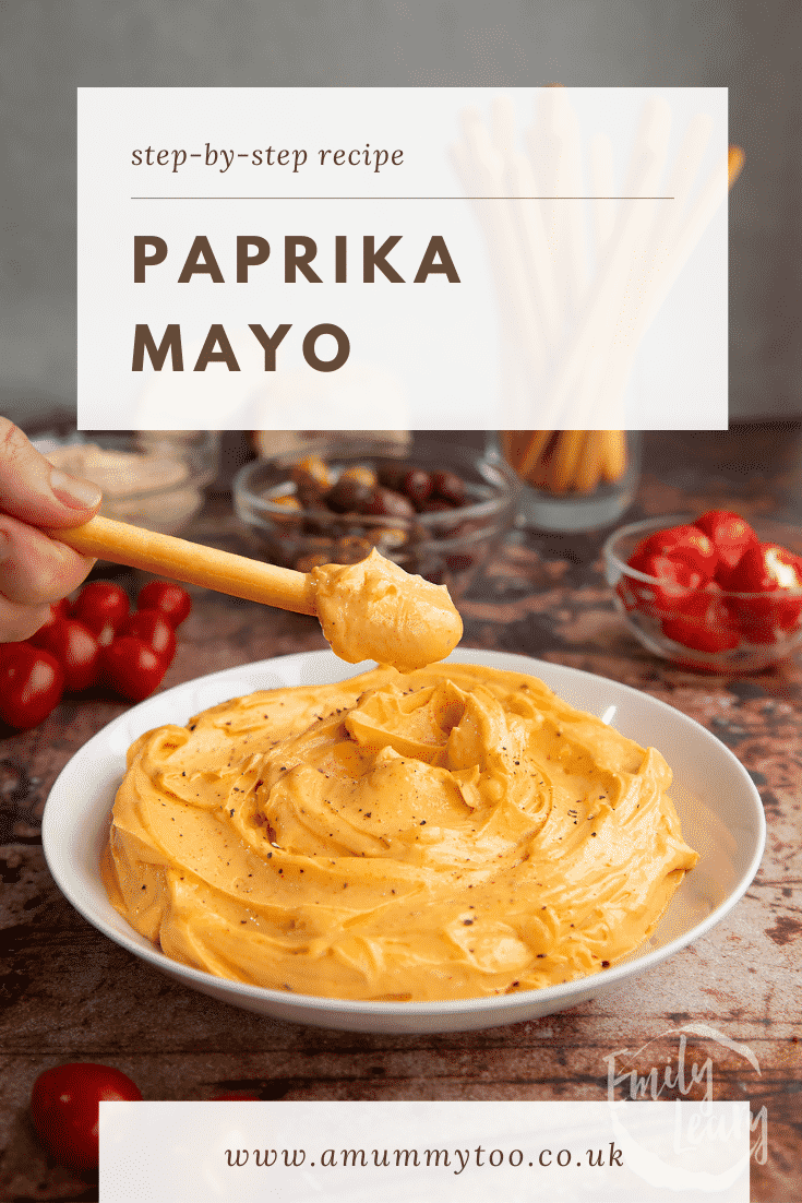 Paprika mayo in a shallow white bowl. A breadstick is being dipped in. Caption reads: Step-by-step recipe paprika mayo