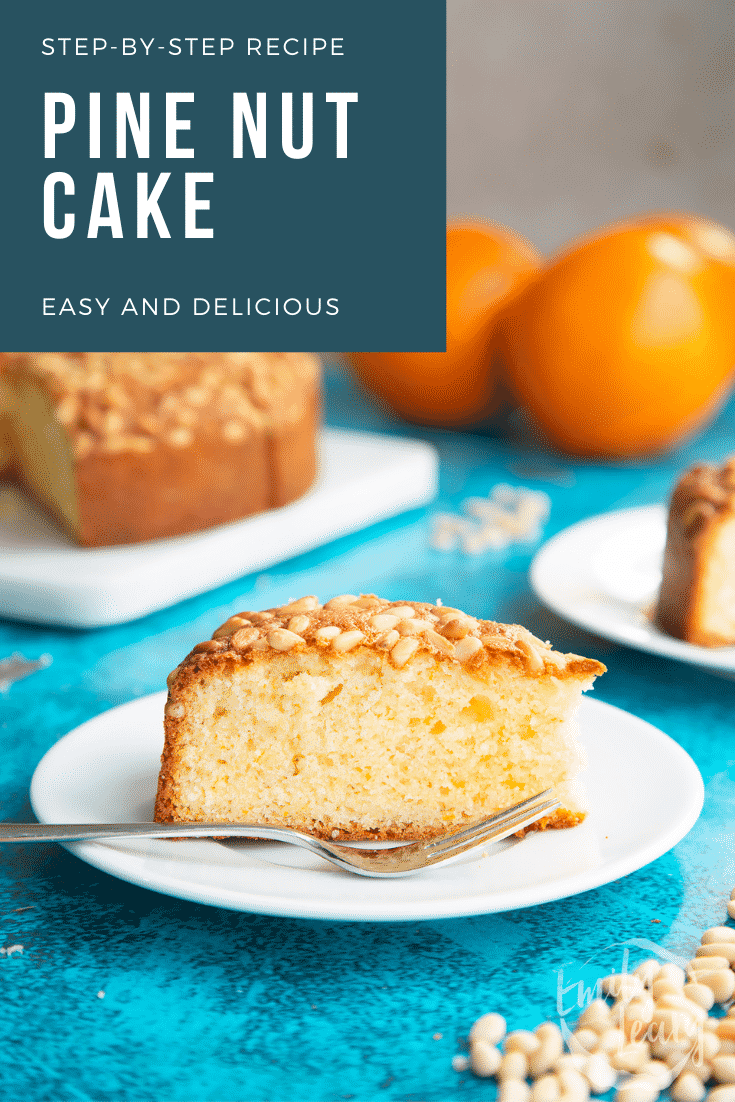 Slice of pine nut cake on a white plate with a fork. Caption reads: Step-by-step recipe pine nut cake. Easy and delicious.
