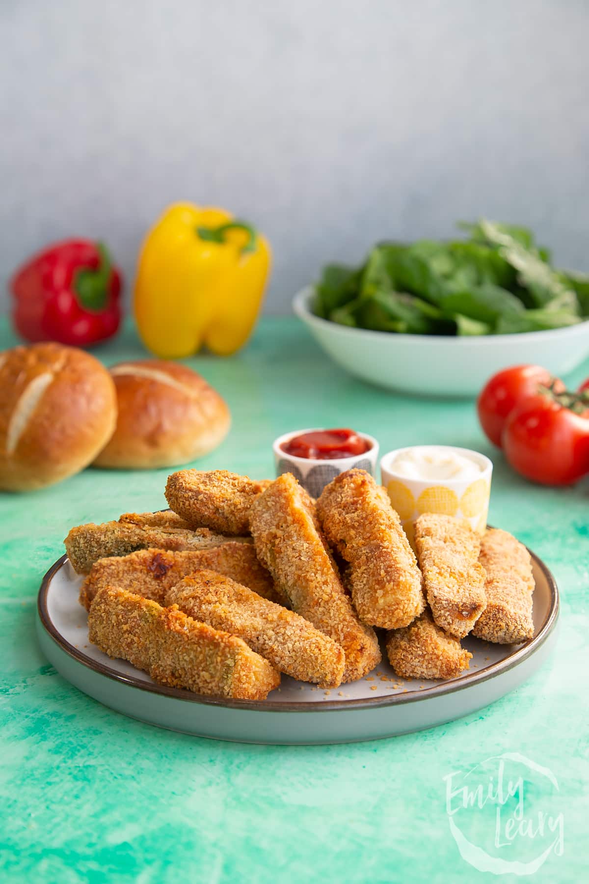A finished plate of baked courgette fries.
