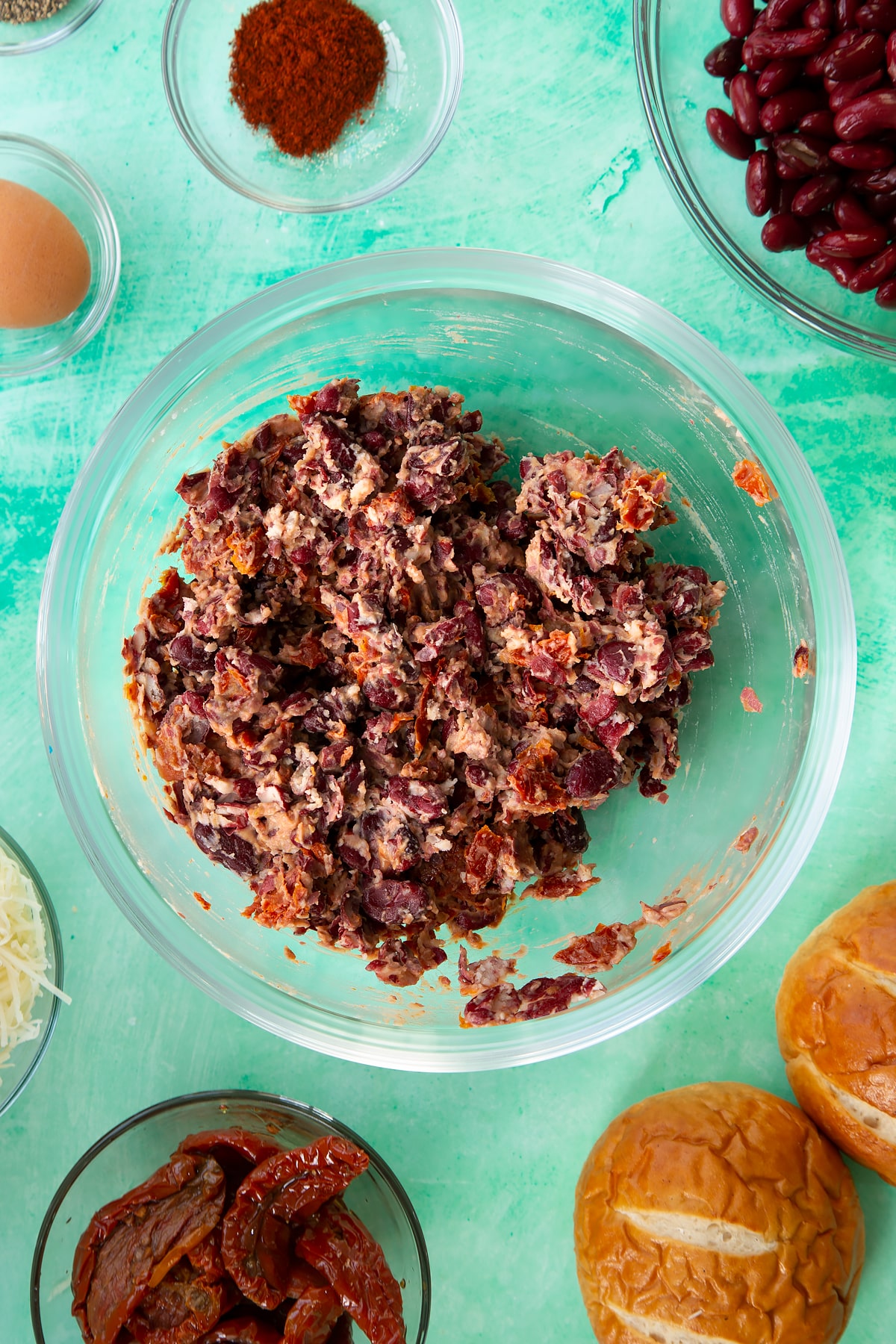 Overhead shot of the kidney bean burgers ingredients mixed together in a mixing bowl.
