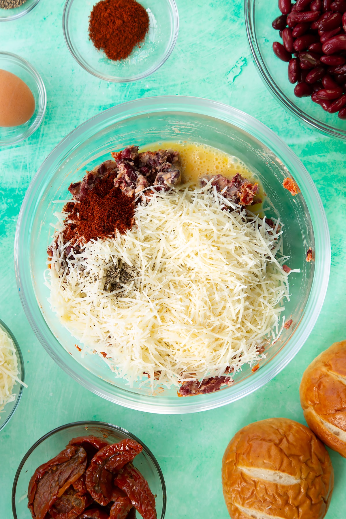 Overhead shot of the kidney bean burgers ingredients mixed together in a mixing bowl.