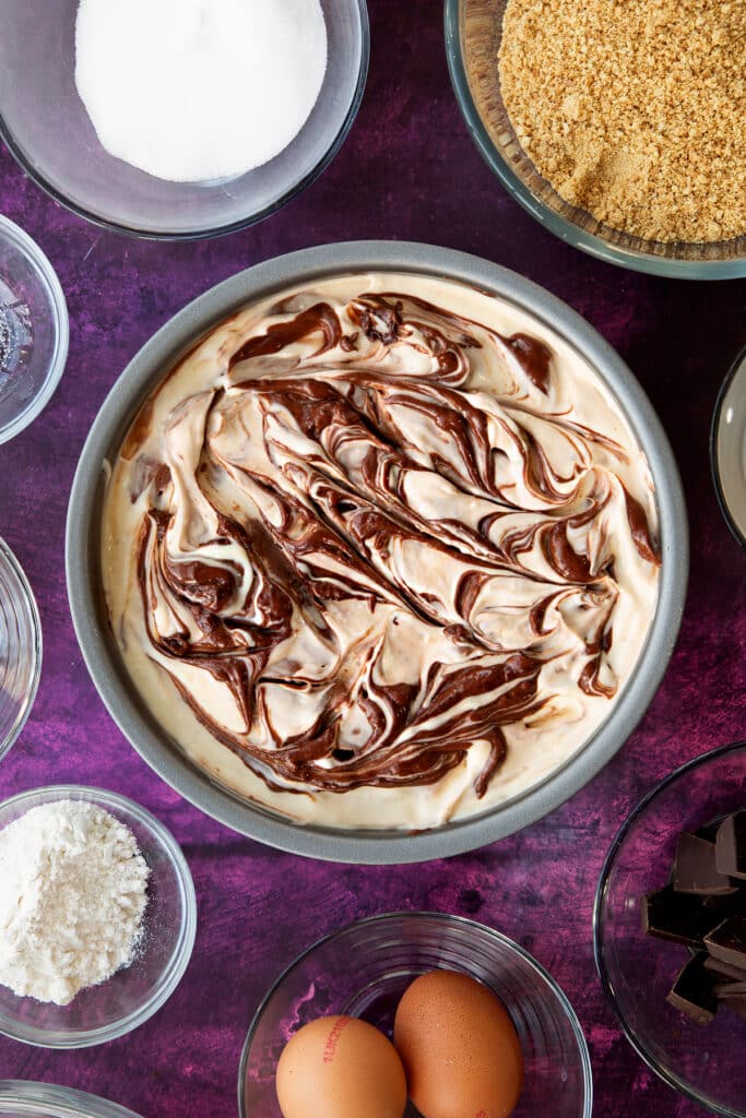 Overhead shot of the finished marble cheesecake before going into the oven.