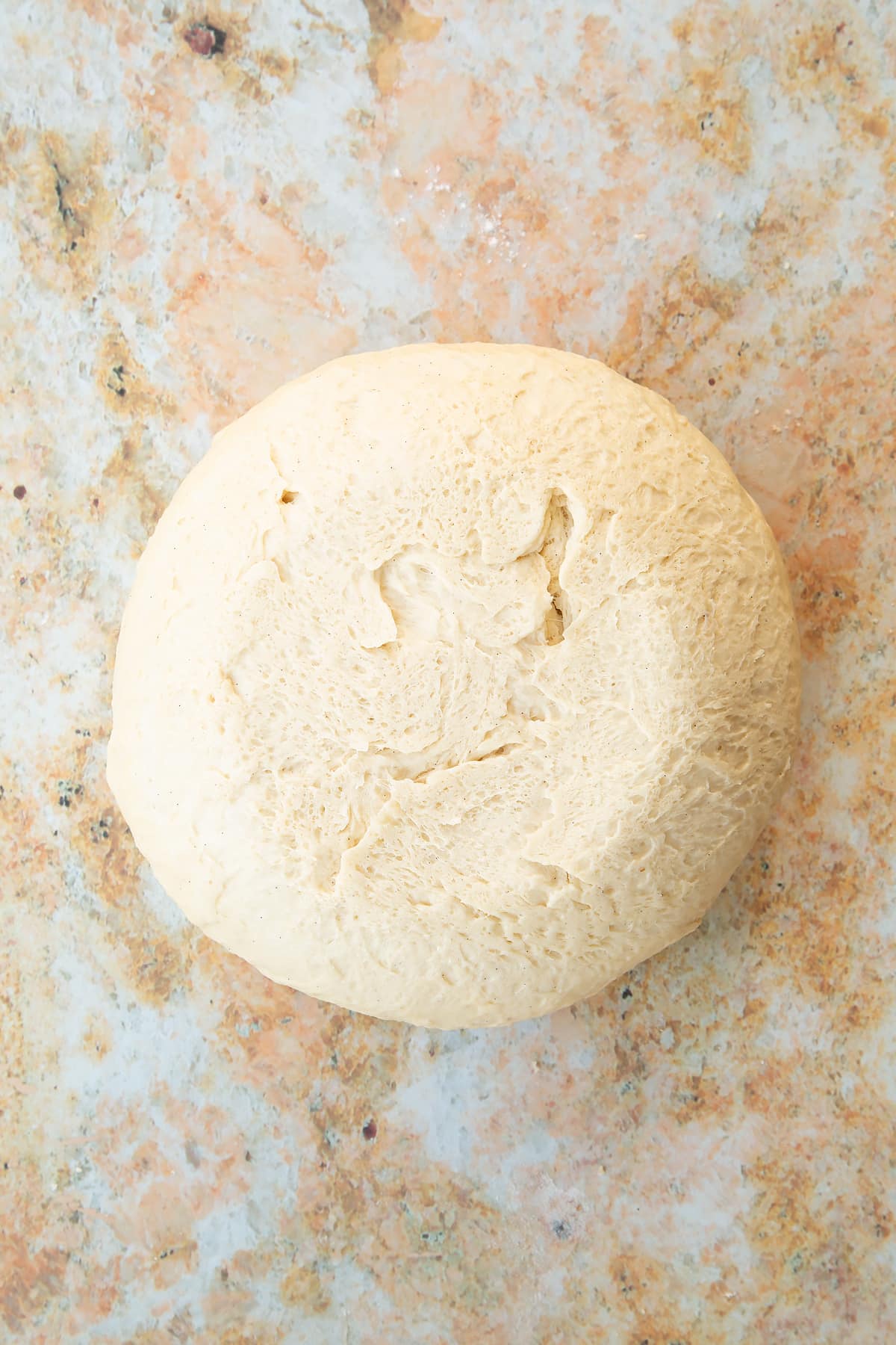Overehad shot of one of the rolls from the dough.