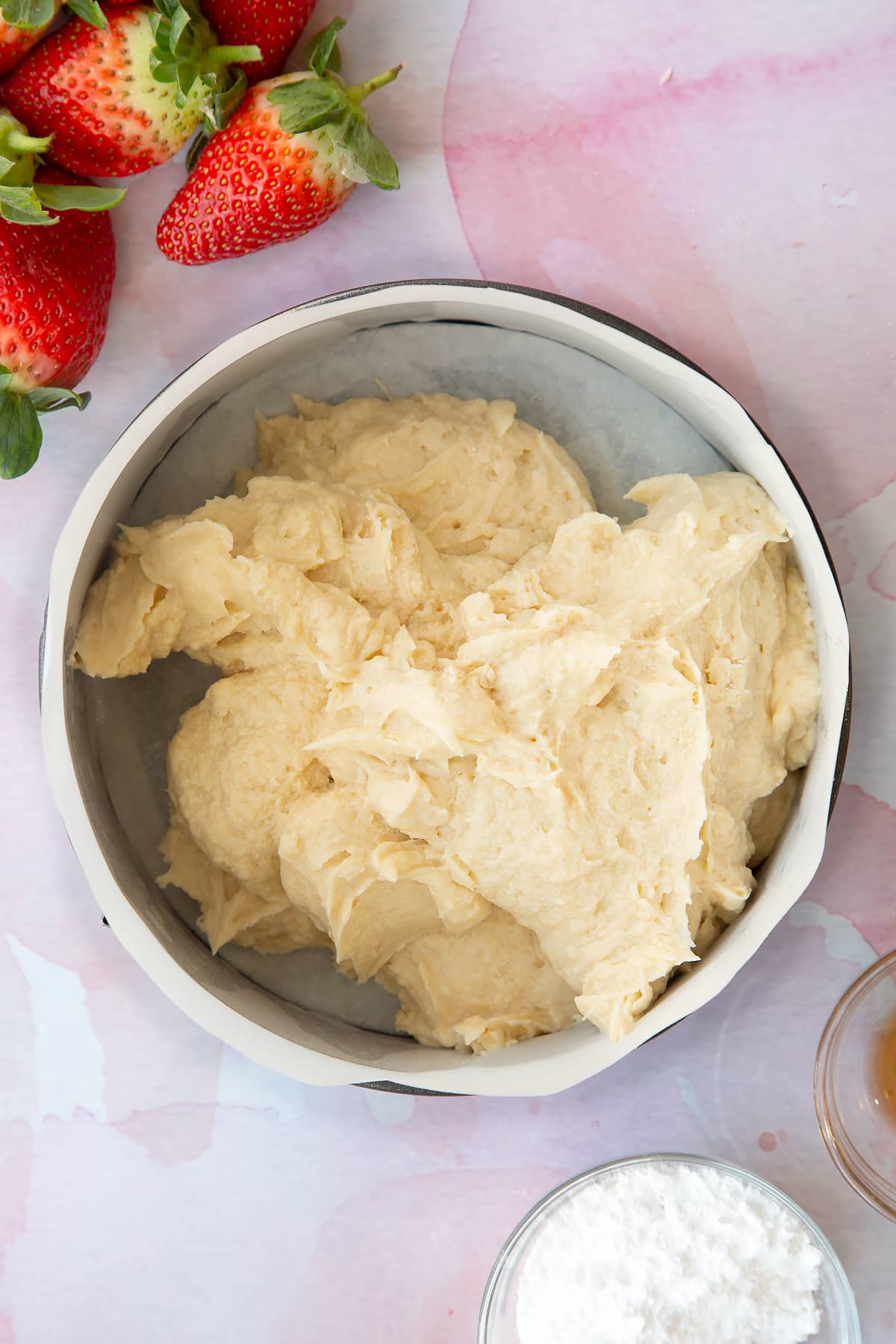 creamed mixture in a parchement lined cake tin