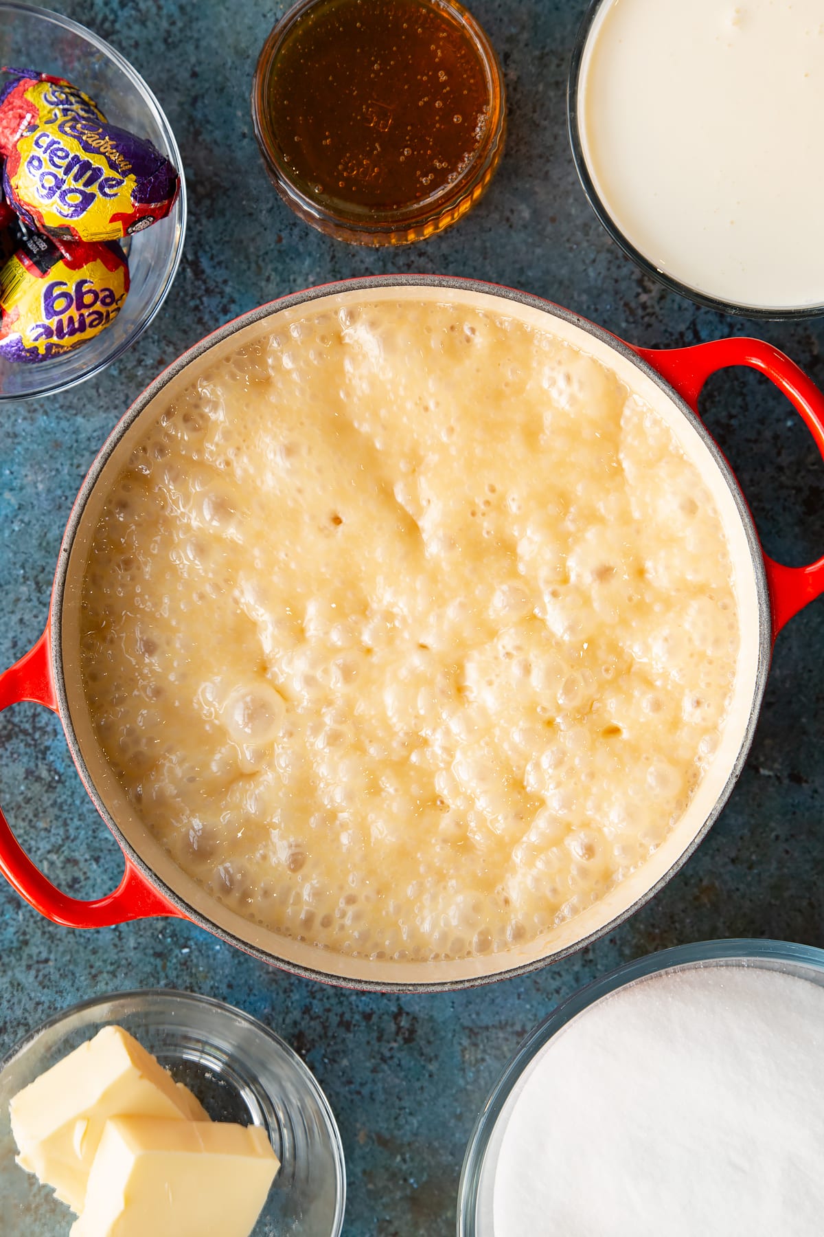 Overhead shot of the wet ingredients bubbling in a pan.