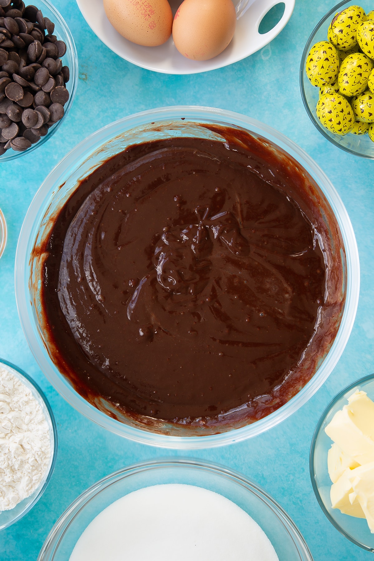 Mixing the easter brownies wet ingredients together in a mixing bowl.