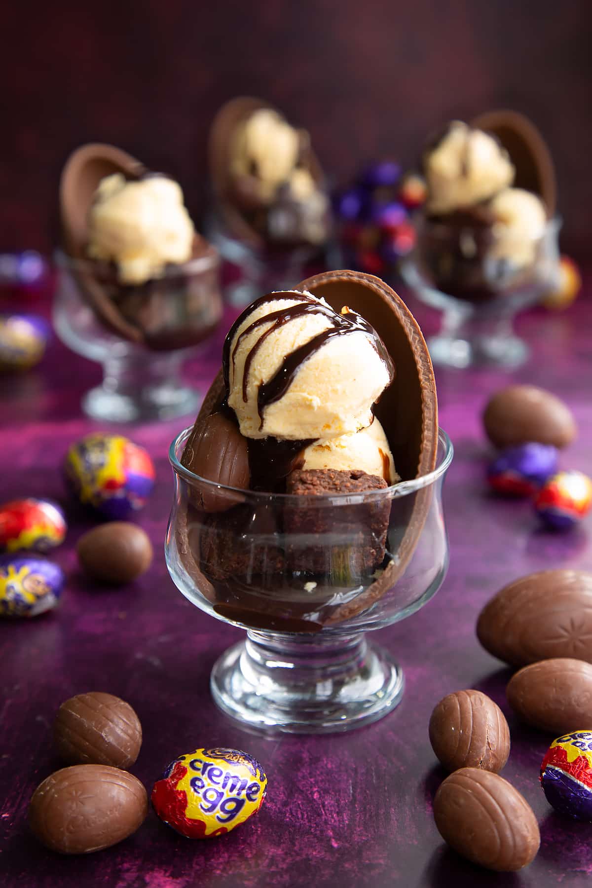 Easter egg sundae drizzled in chocolate sauce.