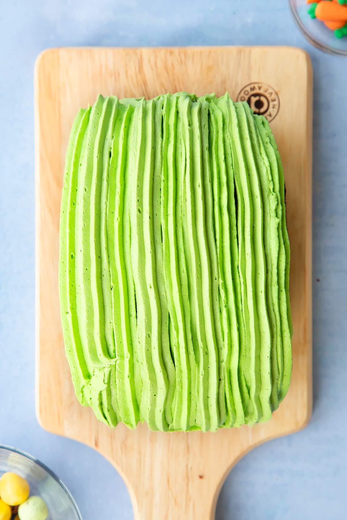 Easter loaf cake with lines of green icing ontop.