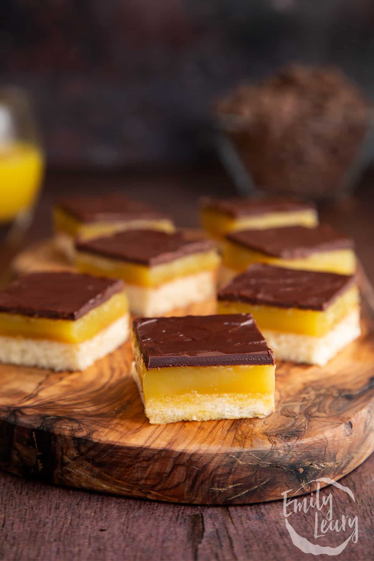 Jaffa Cake traybake slices on a wooden board.