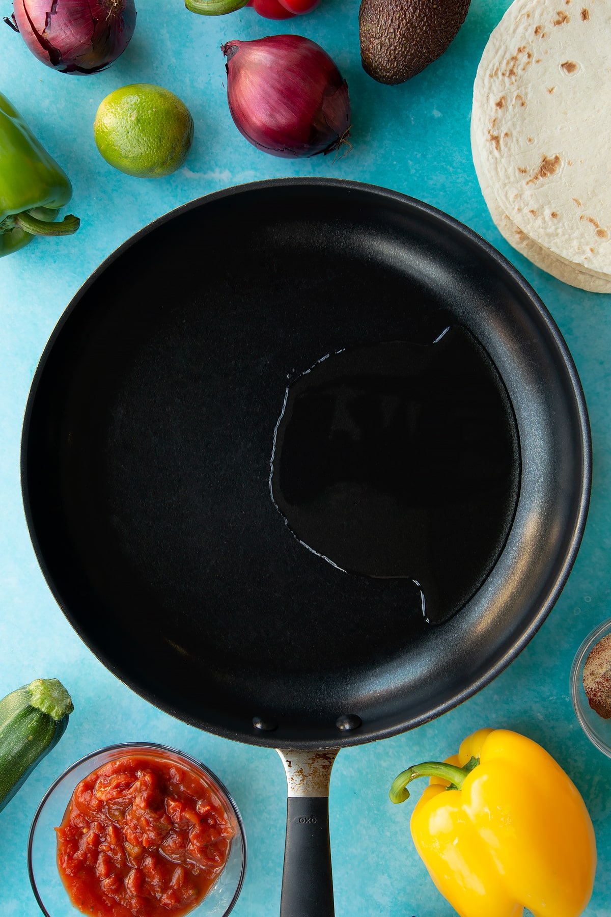 Overhead shot of oil in a frying pan.