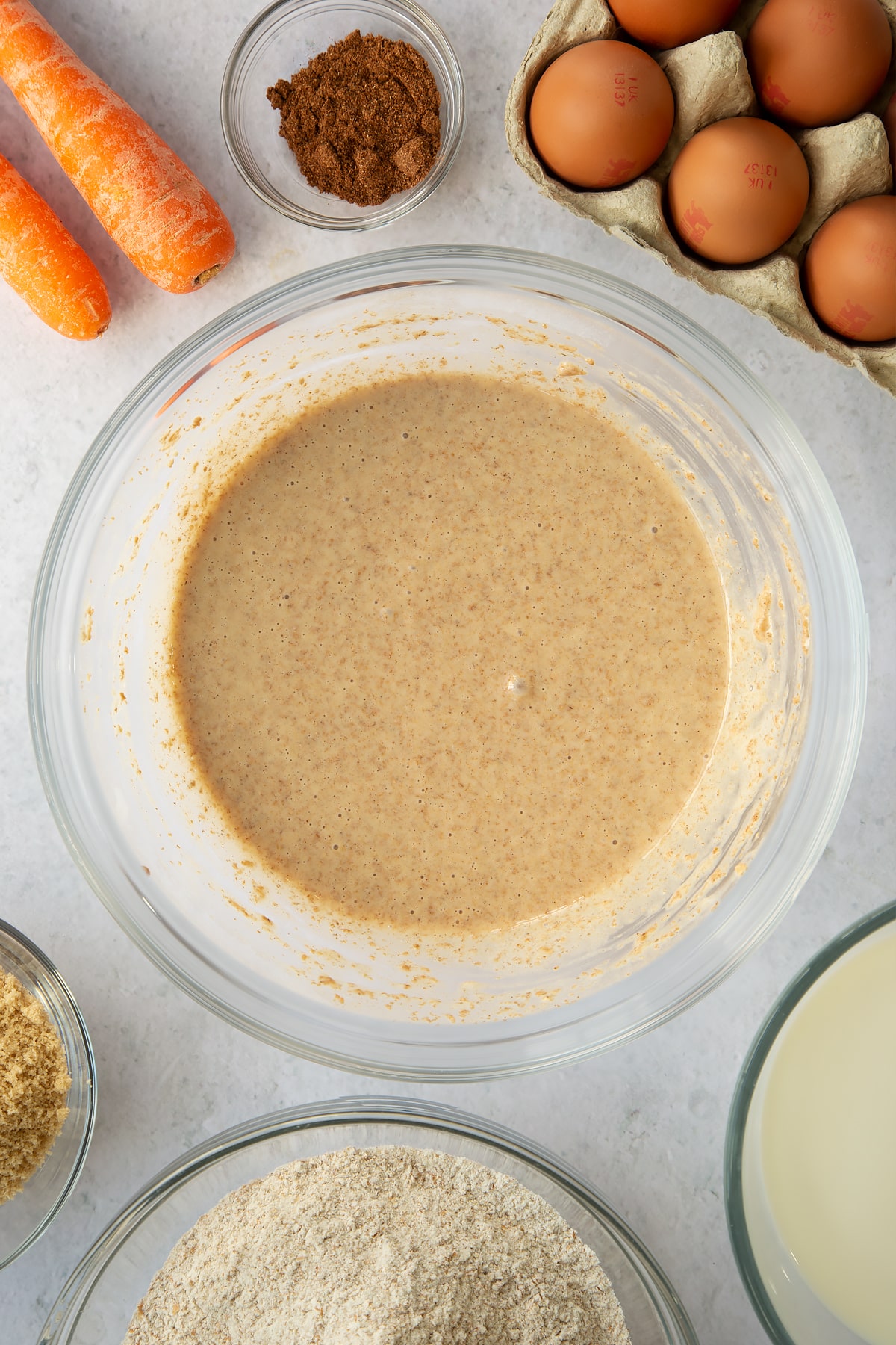 brown sugar, egg and flour mixture in a large clear bowl.
