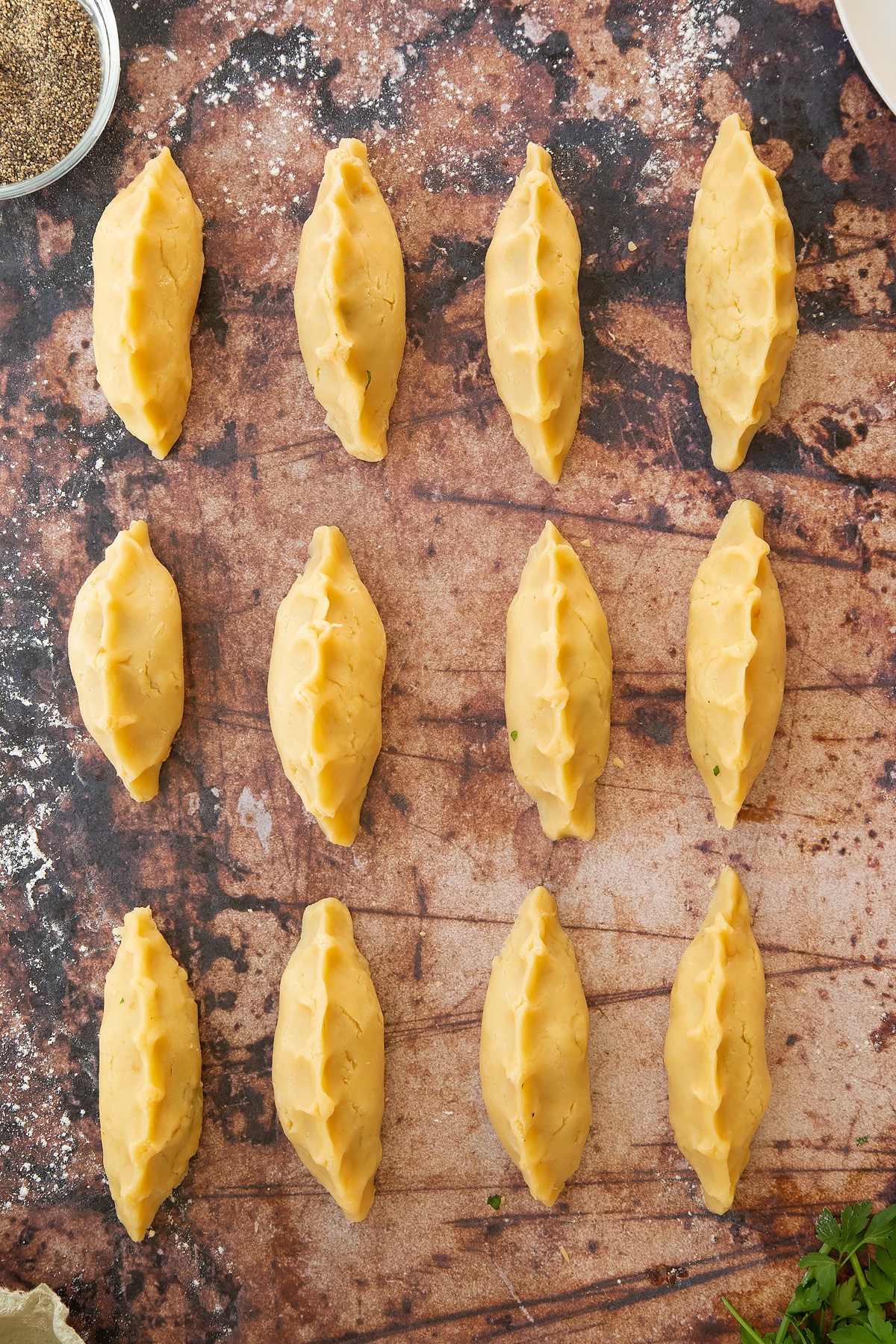 Overhead shot of the finished mini cornish pasties ready for the oven.