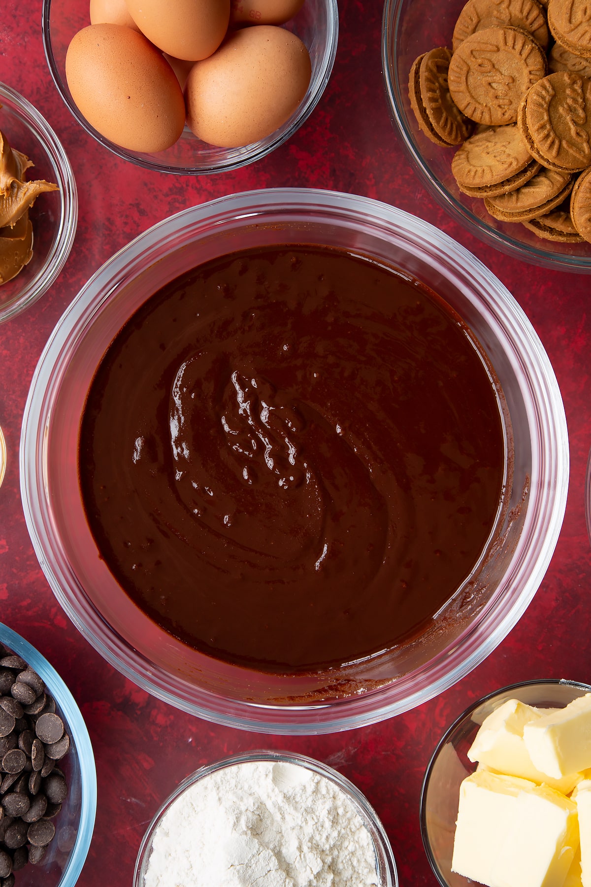 mixed sugar and melted chocolate mix in a large clear bowl.