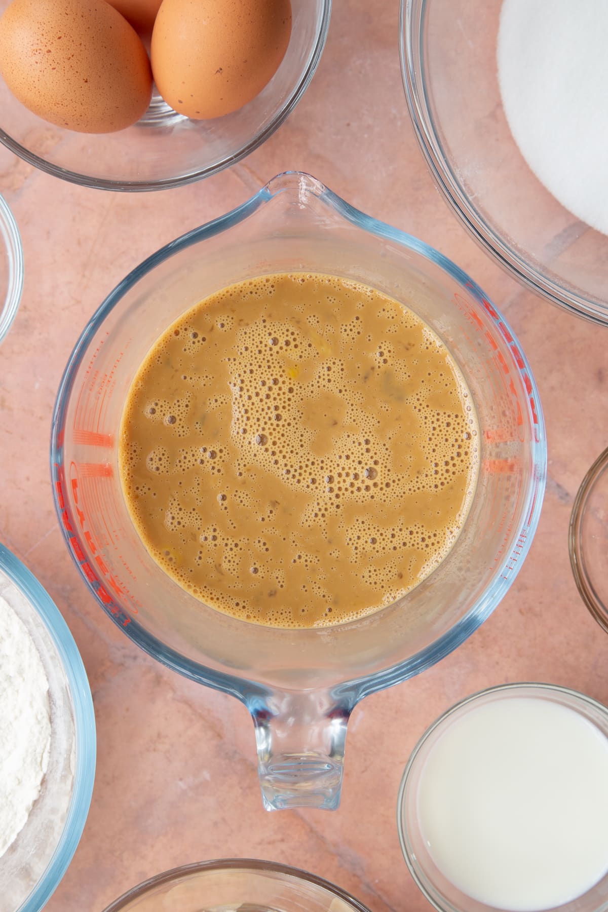 mixed coffee and eggs in a large measuring jug.