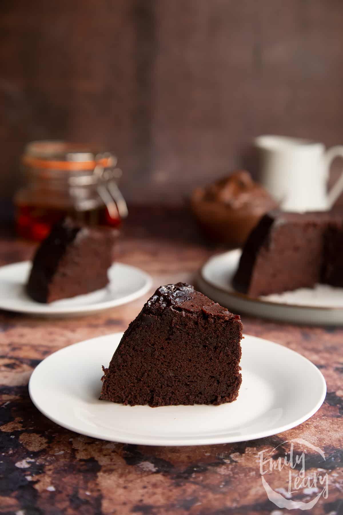 a slice of Nutella pudding cake on a white plate.