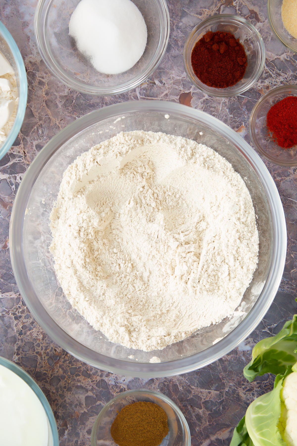 mixed flour, cayenne and garlic in a large clear bowl.