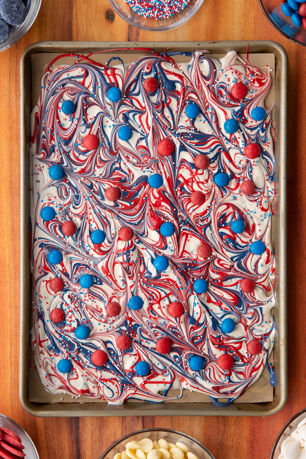 Adding blue and red M&Ms to the red, white and blue bark.