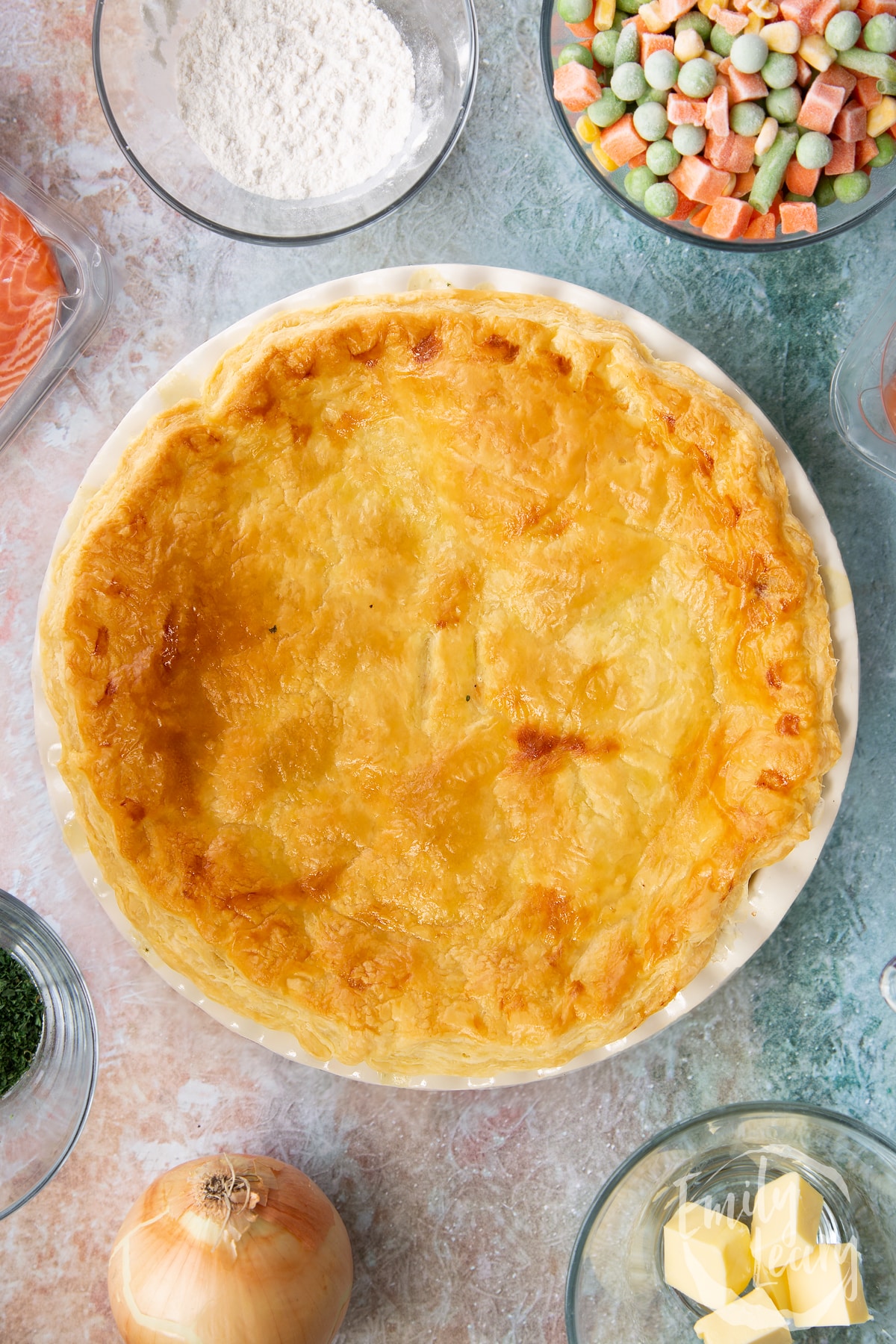 Overhead shot of the salmon pot pie having been cooked in the oven.